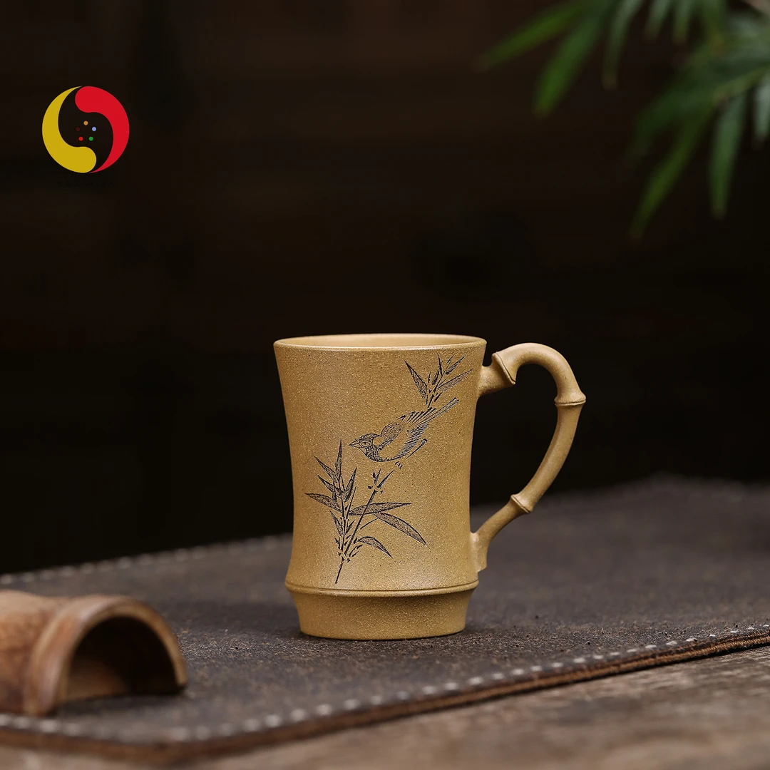 宜兴黄段竹节鸟手把杯 刻绘主人杯