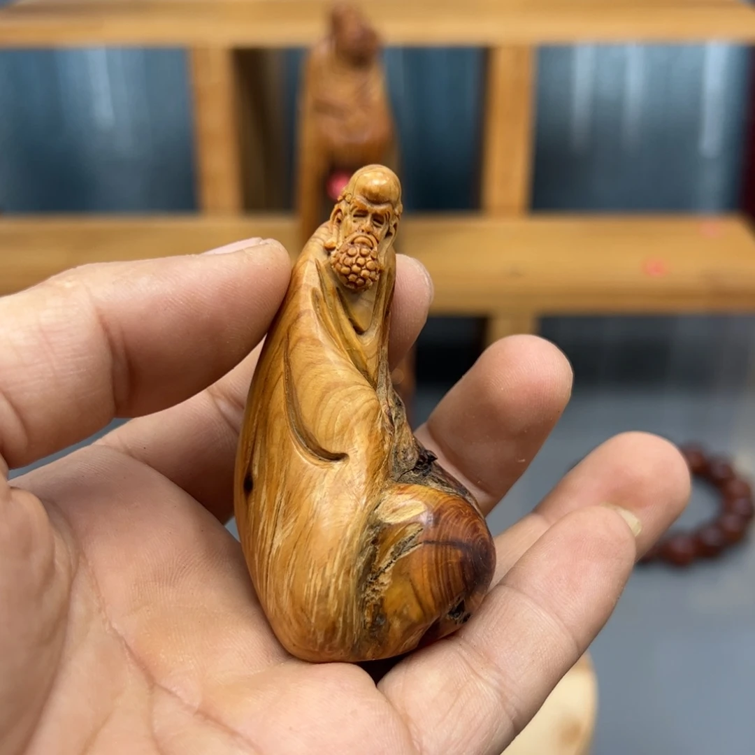 萧***灬木崖柏木摆件手把件