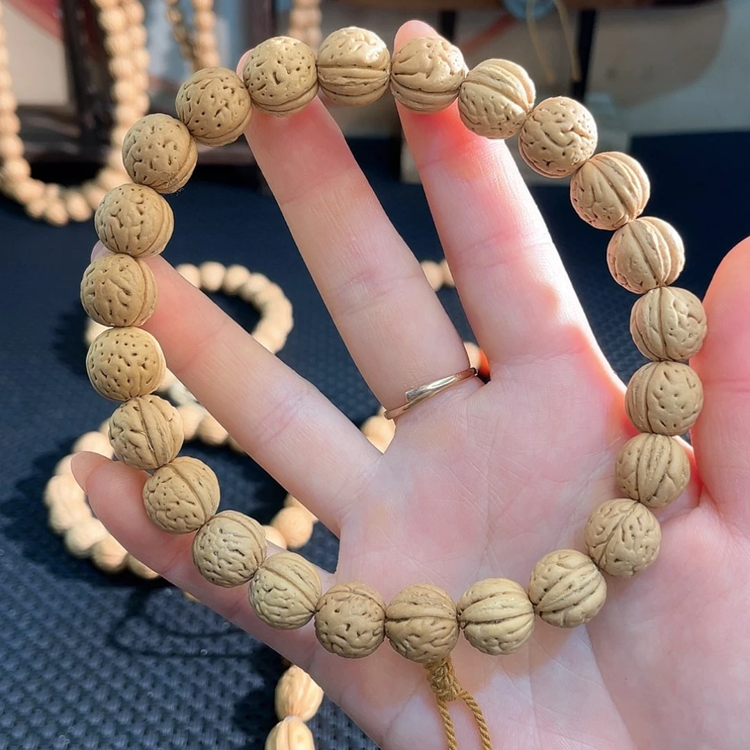 树脂制品?*12加野生桃核单圈手持