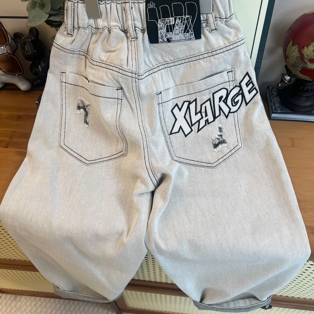 男童个性水洗黑白色牛仔裤2025春秋新款字母刺绣休闲裤百搭长裤子