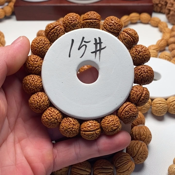 小***溜桃核吊坠精品桃核手串凤尾