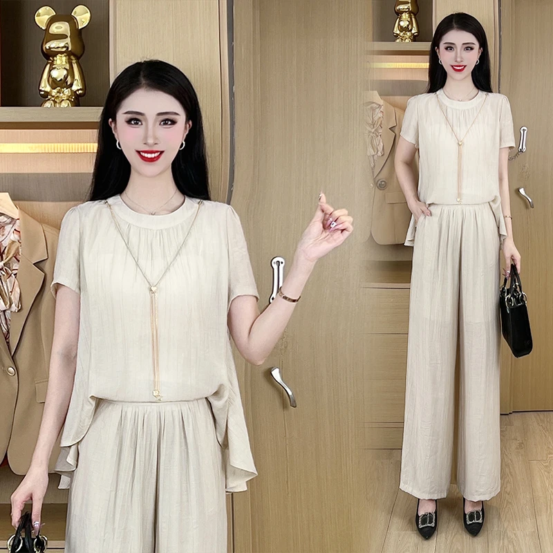 设计师款套装2025夏季气质显瘦时尚不规则上衣阔腿裤两件套86061