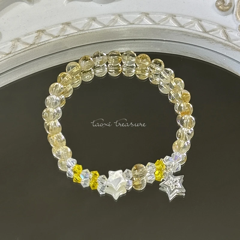 tx971-黄塔水晶贝壳星星s925银星星手串