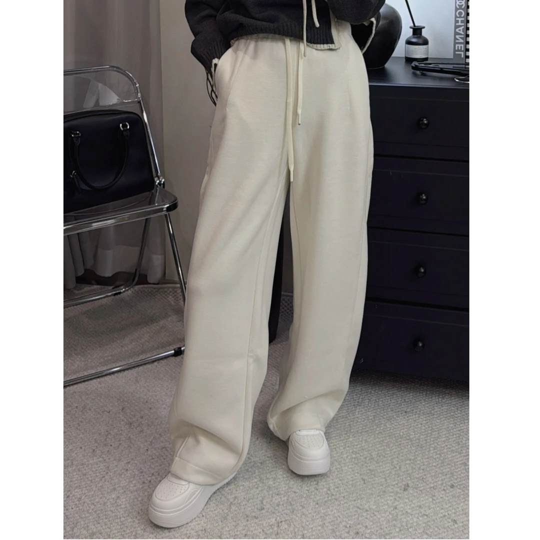 506197 小CC时尚穿搭2025冬季新款休闲百搭加厚微弯刀羊毛裤