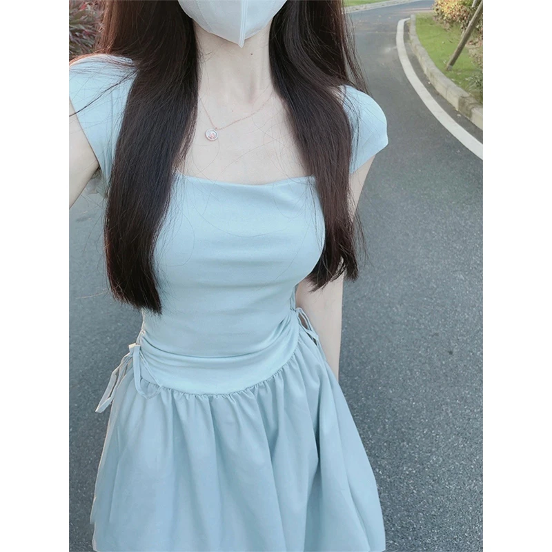白色连衣裙女夏2025感法式收腰抽绳拼接假两件小飞袖吊带裙长裙子