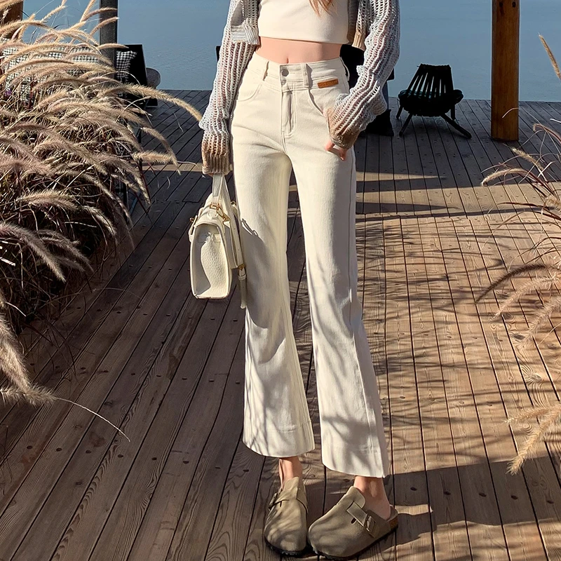 2025年新款春季米白色微喇牛仔裤女修身显瘦高腰小个子九分微喇叭