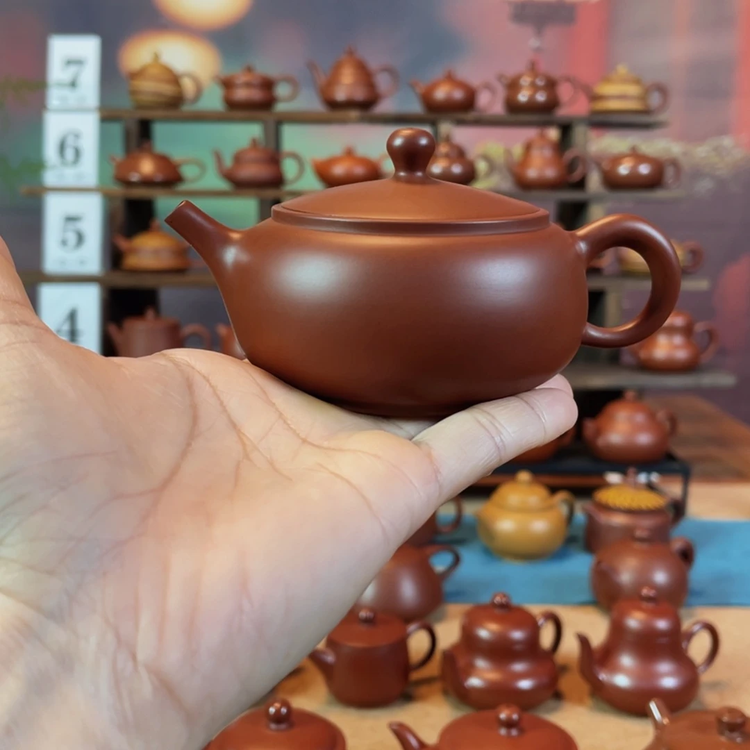 茶壶紫砂老****叔潮州手工手拉朱泥广源壶
