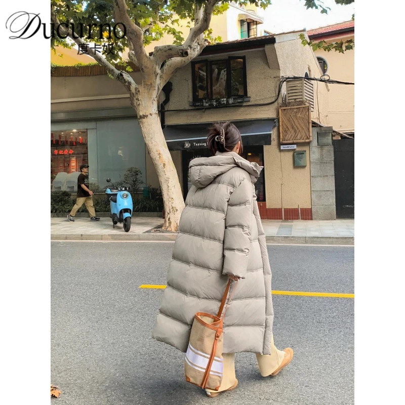 百搭灰色超长过膝羽绒服2025年冬季新款宽松连帽韩版休闲保暖外套