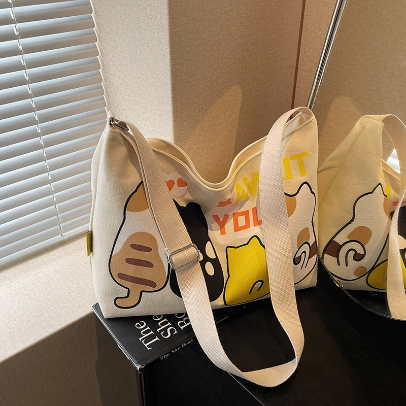 时尚休闲卡通帆布斜挎包女大容量2025新款百搭托特包大学生上课包