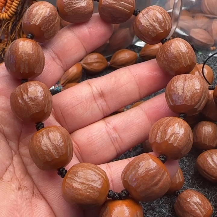 橄榄核手串?***?橄榄核原皮铁盒三面佛