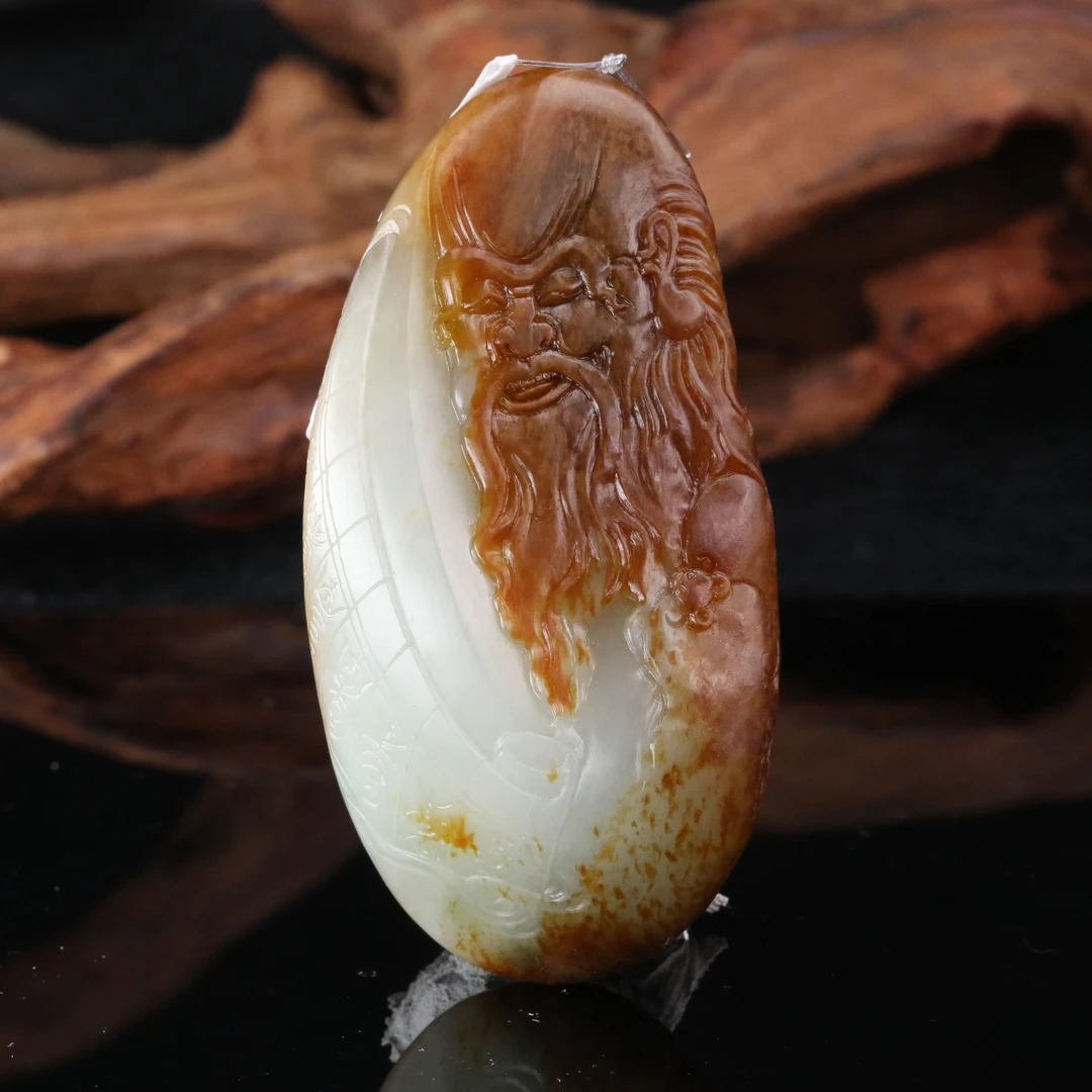 49和田玉红皮寿星（钟文杰作）/000614上海嘉禾拍卖