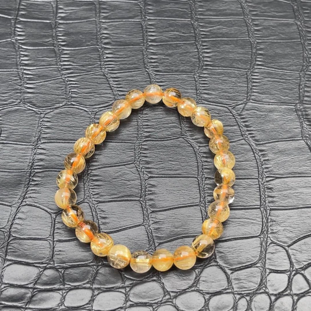 一***冻水晶未镶嵌手串金钛晶