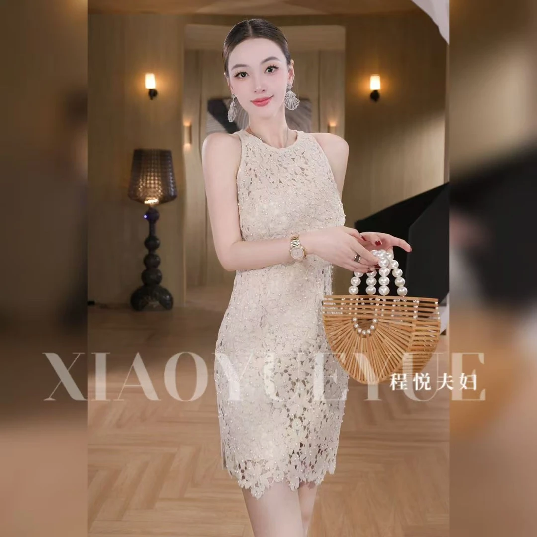 程悦夫妇【匠心质造-短款】A-02165法式时尚重工钉珠镂空设计连衣裙