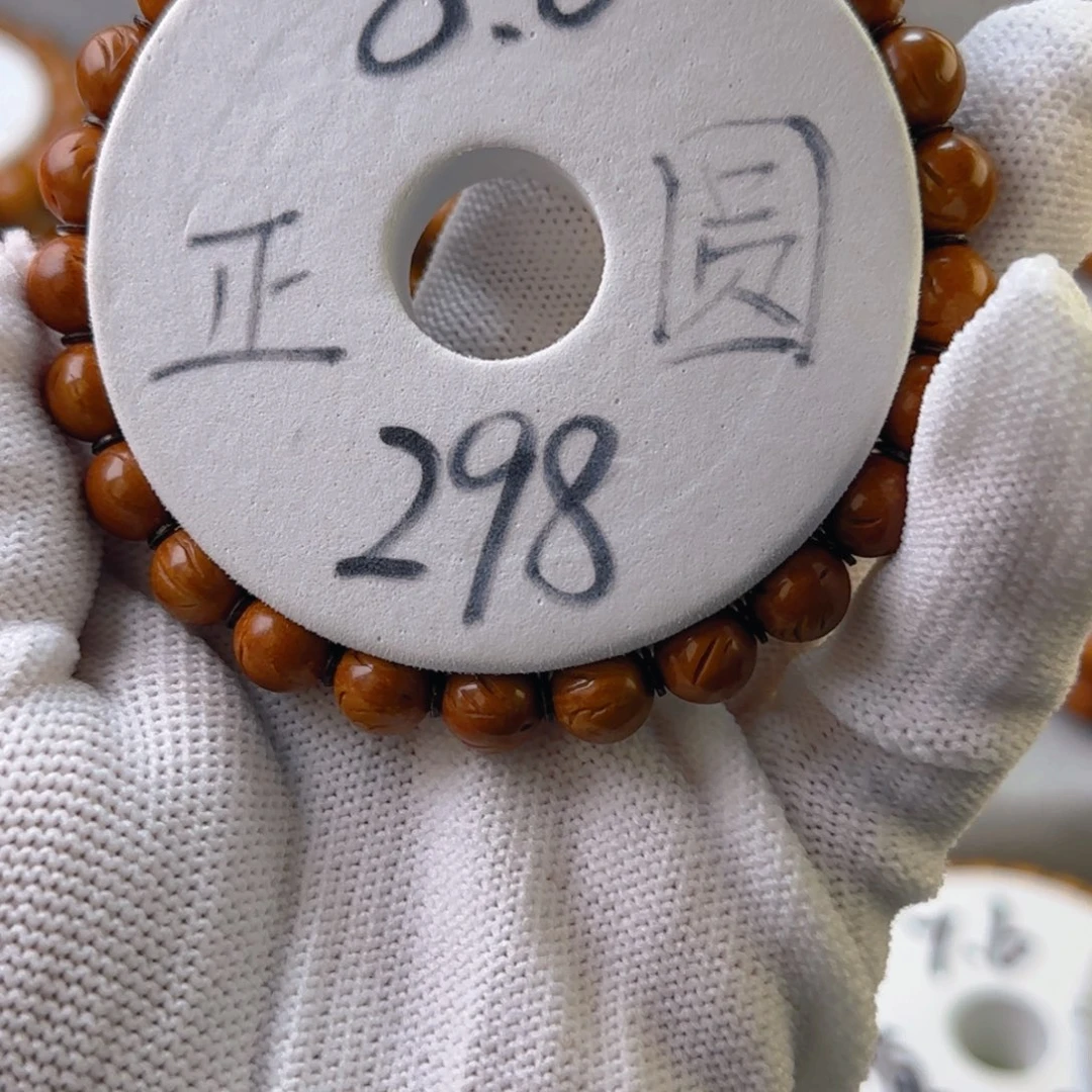 桃核吊坠逗****侣正圆光珠