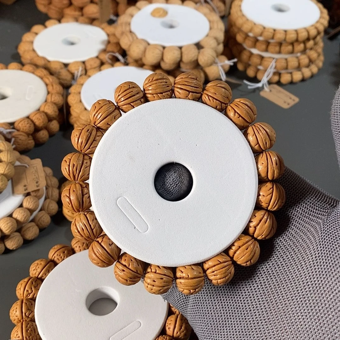 桃核手串坦***下14磨盘肌肉纹