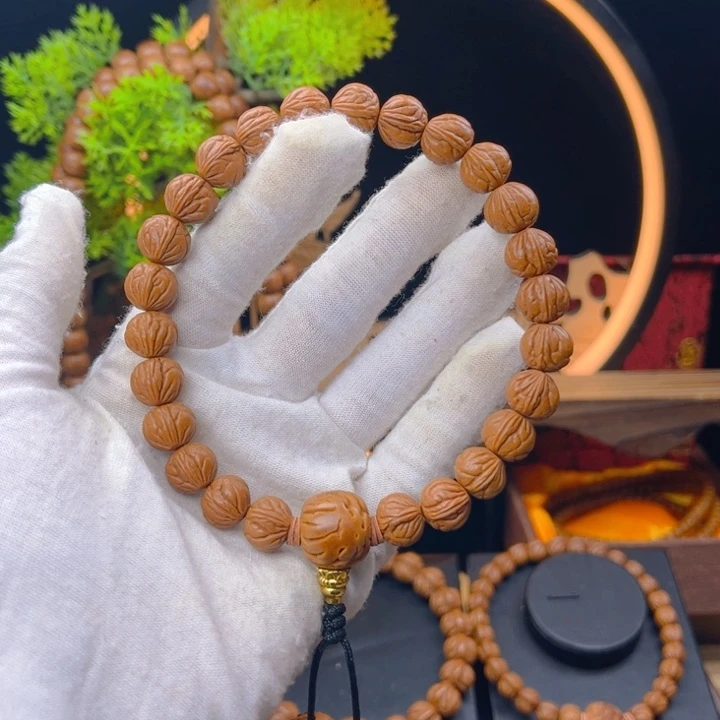 桃核吊坠…**…野生桃核小龙纹手持