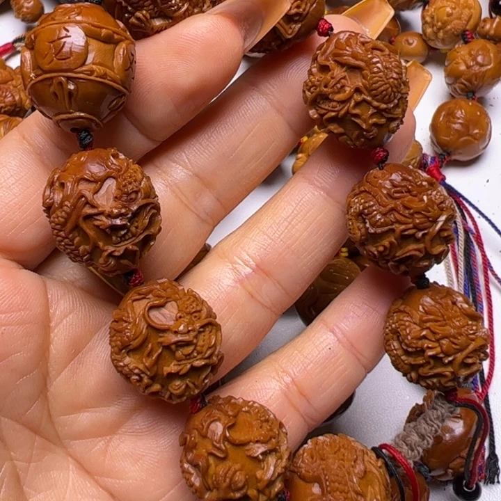 个***扬橄榄核吊坠橄榄核雕刻橄榄核雕的