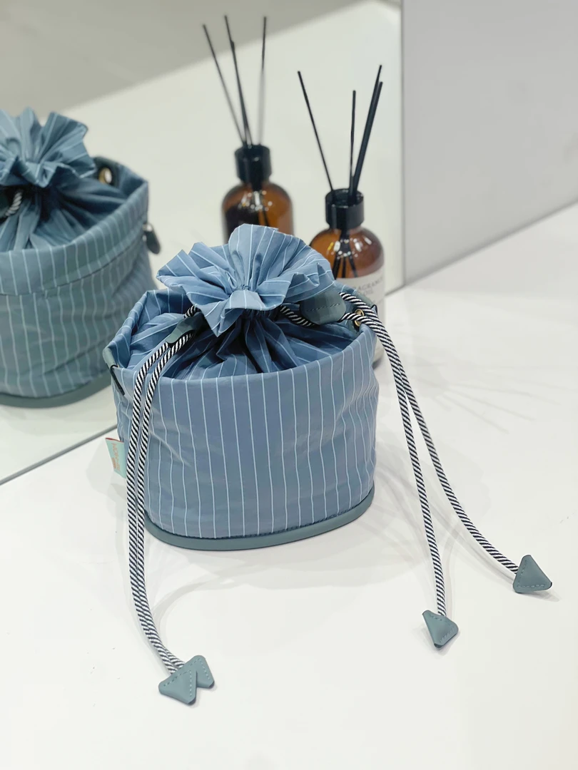 哇吲-新品山系风尚水桶包