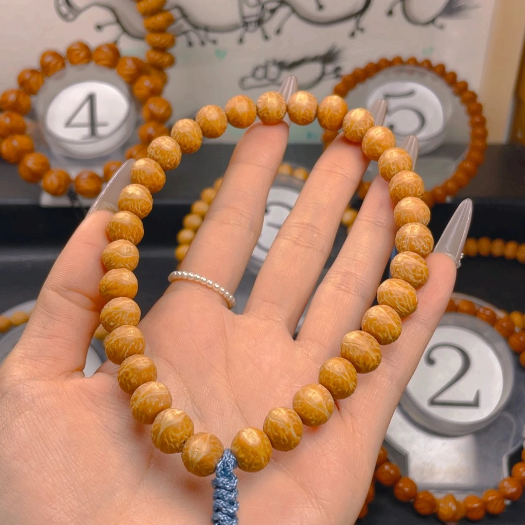 唐***伟文玩核桃吊坠00.9999999