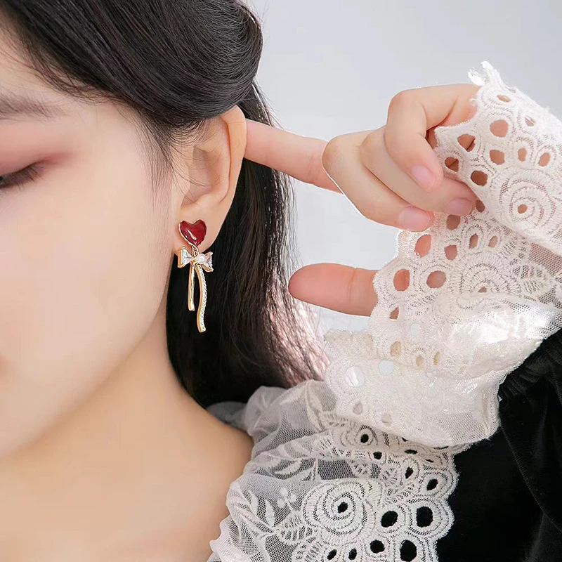 铜合金耳饰 爱心蝴蝶结流苏耳环高级感滴油红色秋冬蚊香盘耳夹