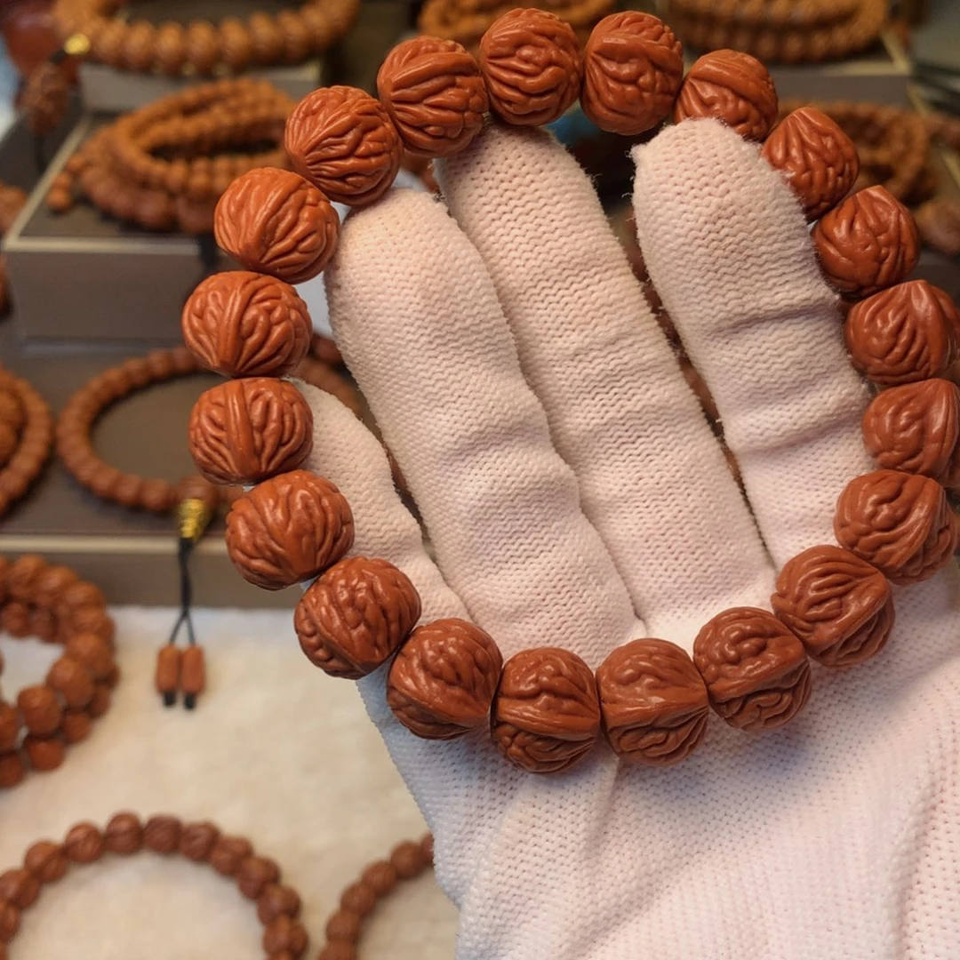 用***4桃核手串秦岭龙纹