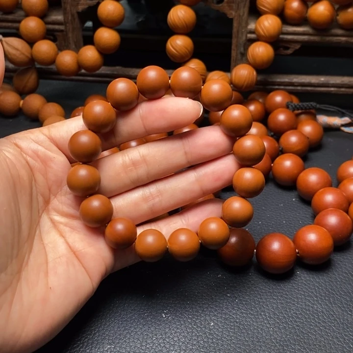 手串橄榄核1.35尺寸红料光珠全品
