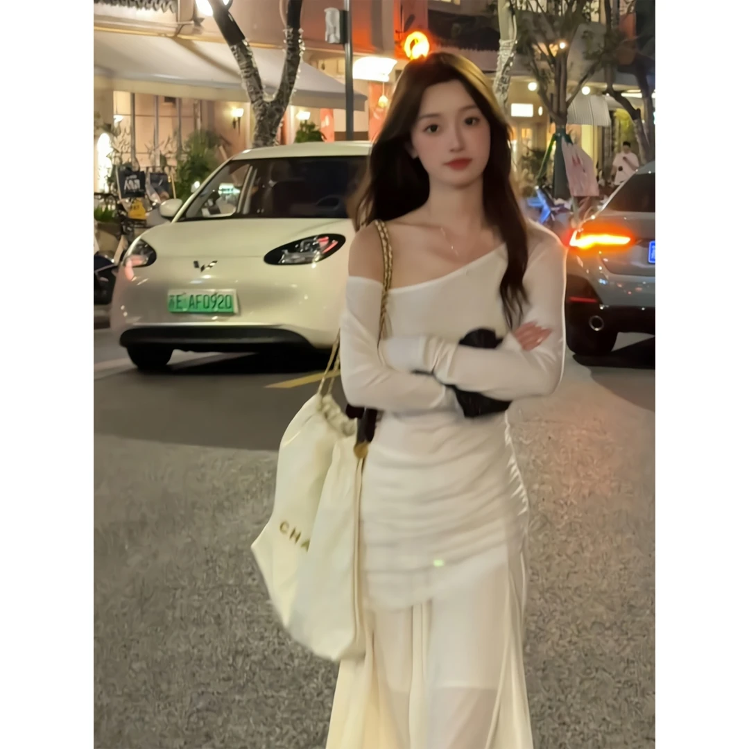 优雅不规则露肩连衣裙女秋季2025新款气质百搭修身显瘦中长款裙子