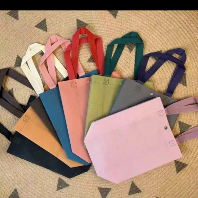 加厚无纺布暗扣款服装包装袋礼品袋立体袋两单以上送店名贴
