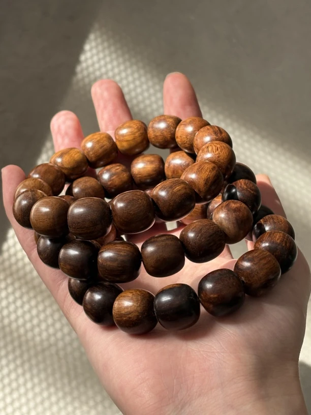 巴布亚贡木15*16老型珠浓香黄油深咖油佛珠手串福利，随机一串精挑