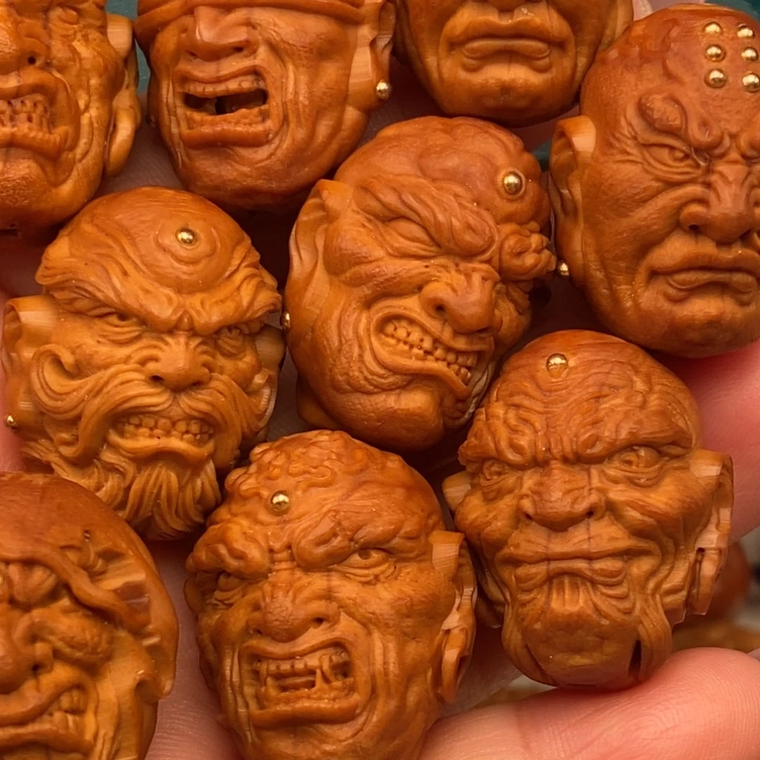 橄榄核吊坠发过好几斤斤计较