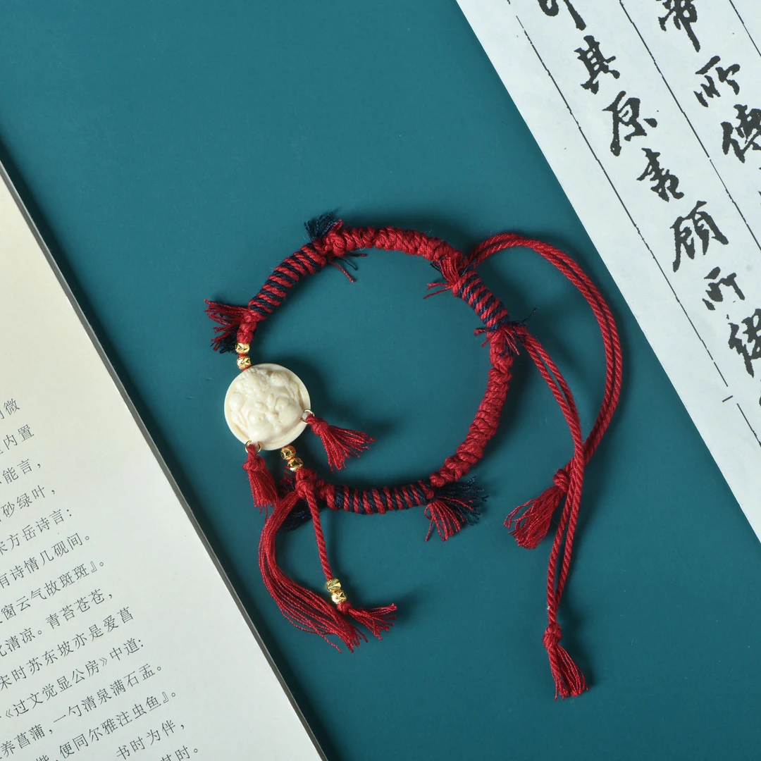 猛犸牙精雕黄财神手编红手绳手链