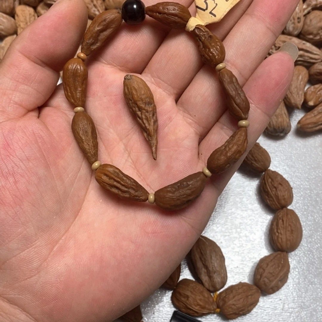 路****}文玩木质核桃手串