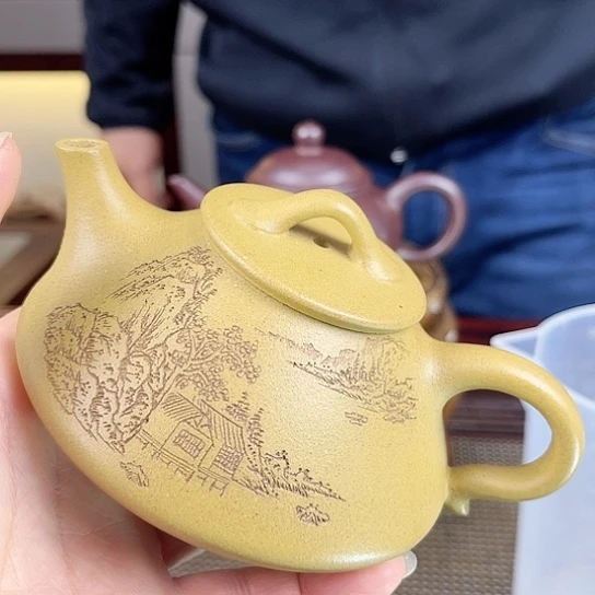 紫砂茶壶今天的天气好热