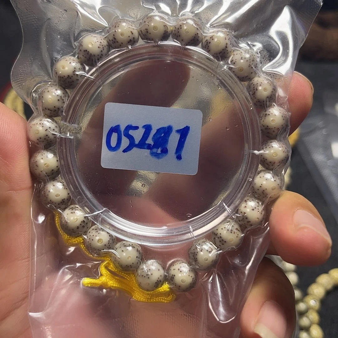 叫***了非金属木质10圆 石玉料 大眼睛 手持