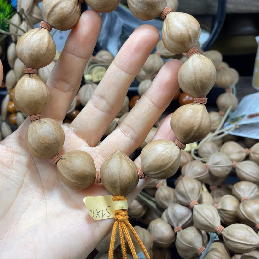 黄***义橄榄核吊坠2125老