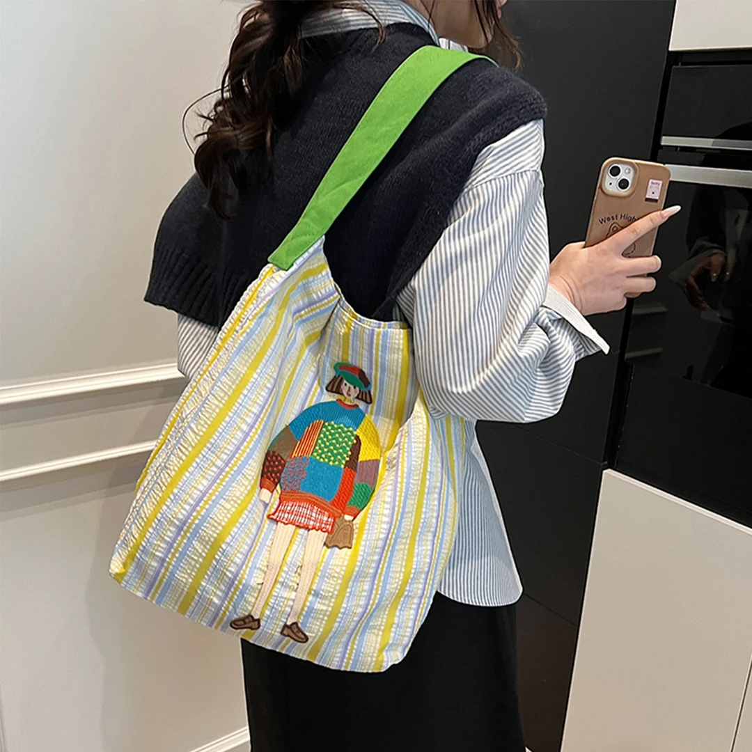 韩版ins条纹帆布包包女大容量2025新款潮简约休闲上班通勤托特包
