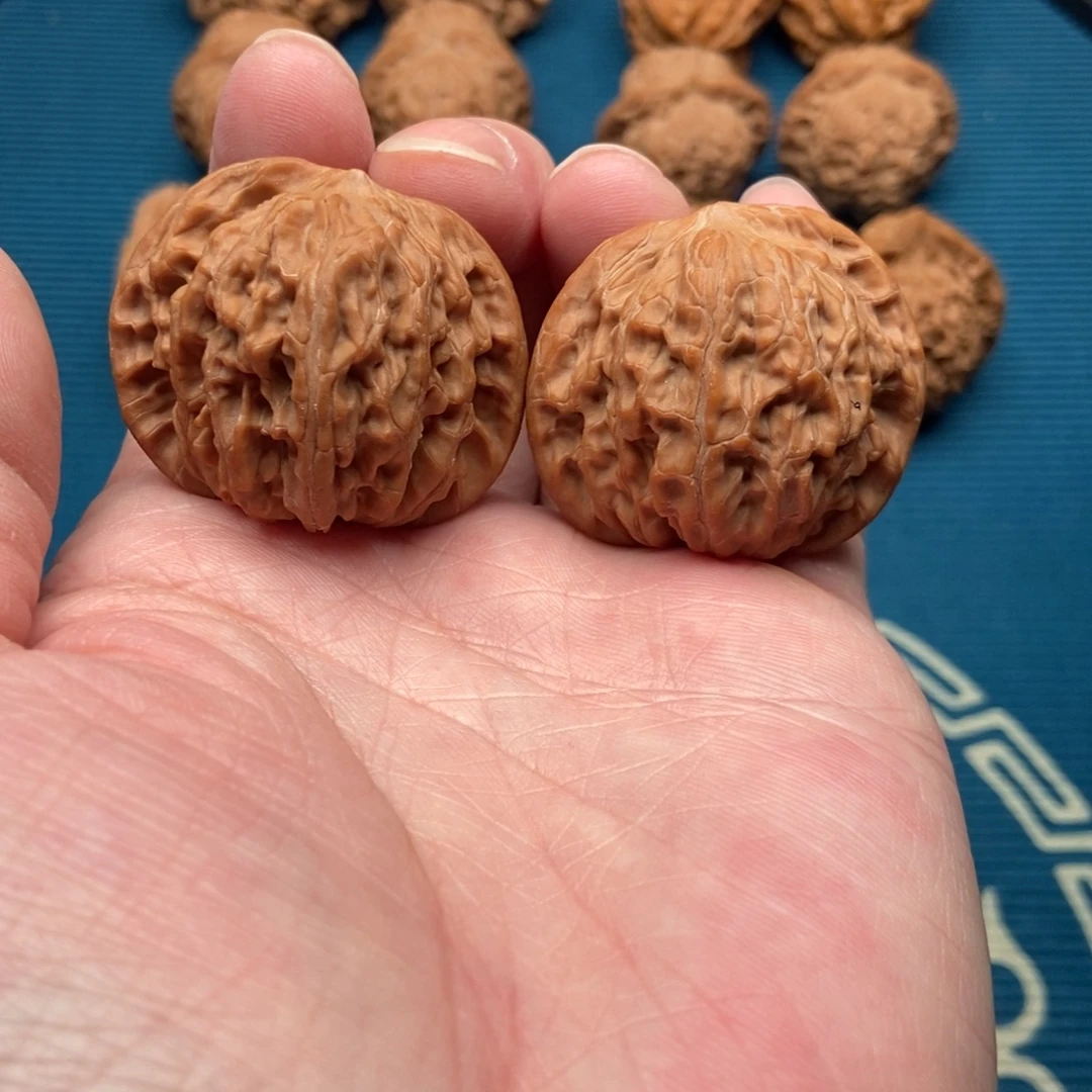 笑***勒文玩核桃把件磨盘