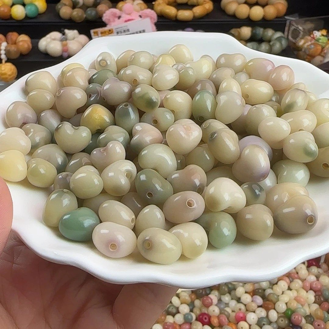 手串菩提根/象牙果卡13.6飘花爱心30颗