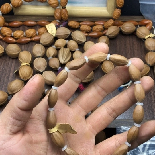 葫***桃吊坠橄榄核咯哦哦哦哦哦我