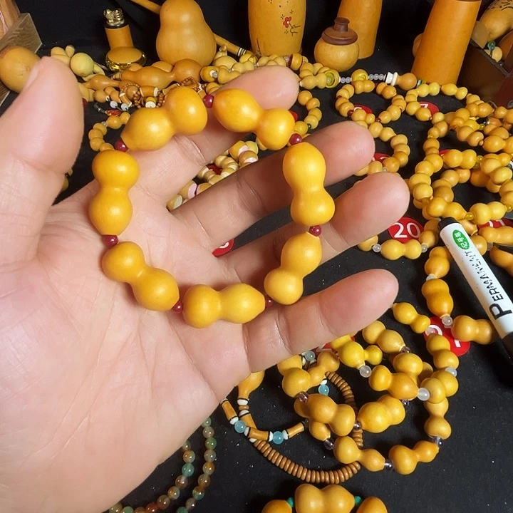 磊*儿2.7尺寸55肚细腰八宝葫芦手串