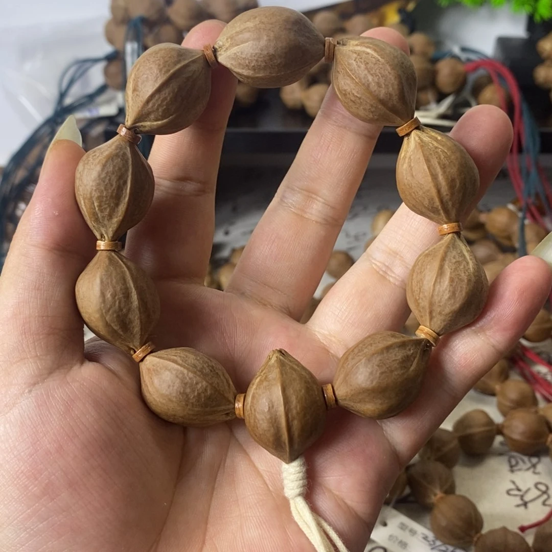 毛***虫橄榄核手串2027精挑梅林铁核