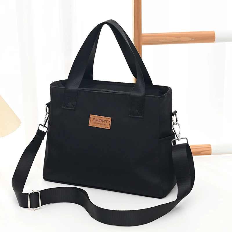 大容量男士手提包A4公文包男女通用上班外出差通勤休闲时尚手提袋