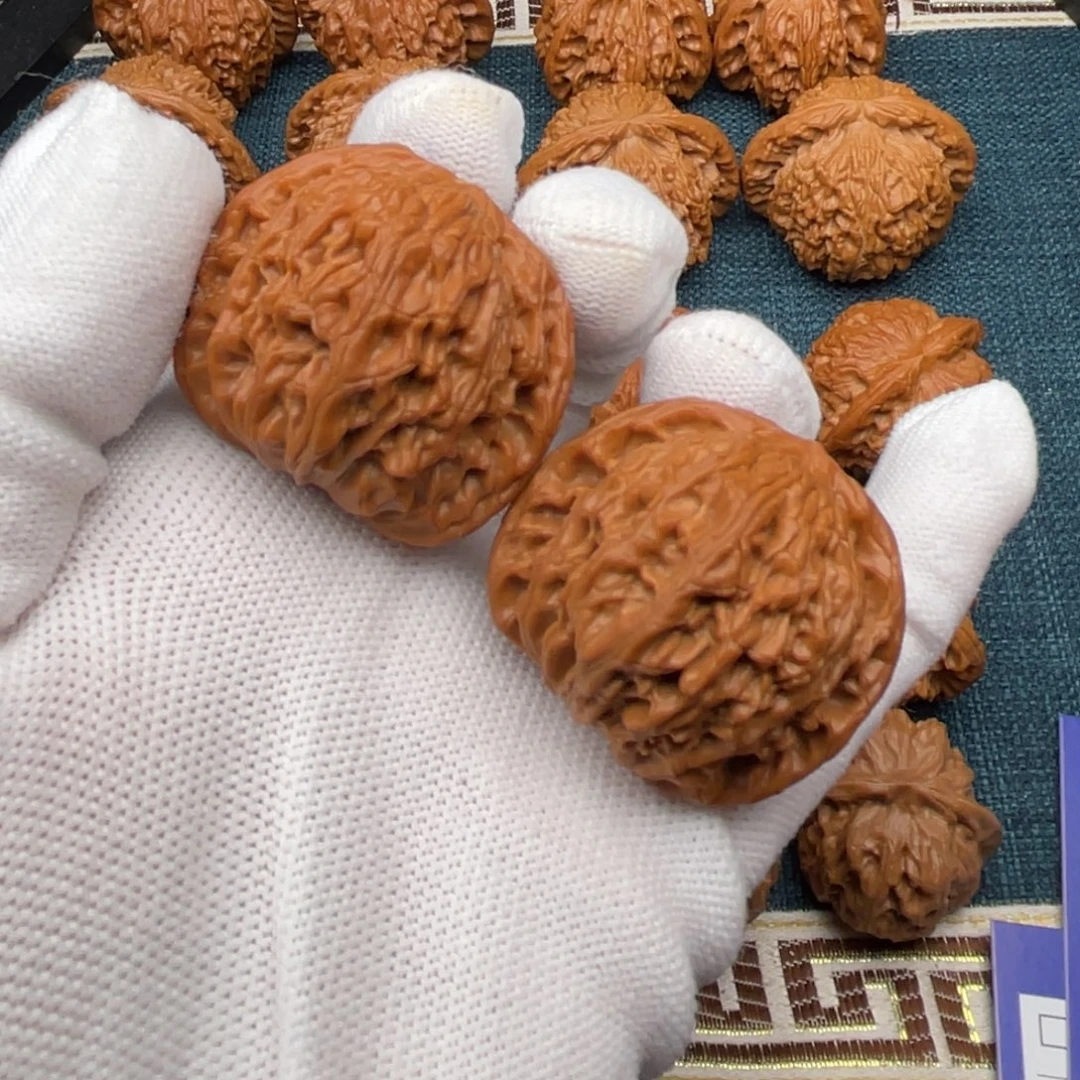 文玩核桃把件40全品红皮山地球磨