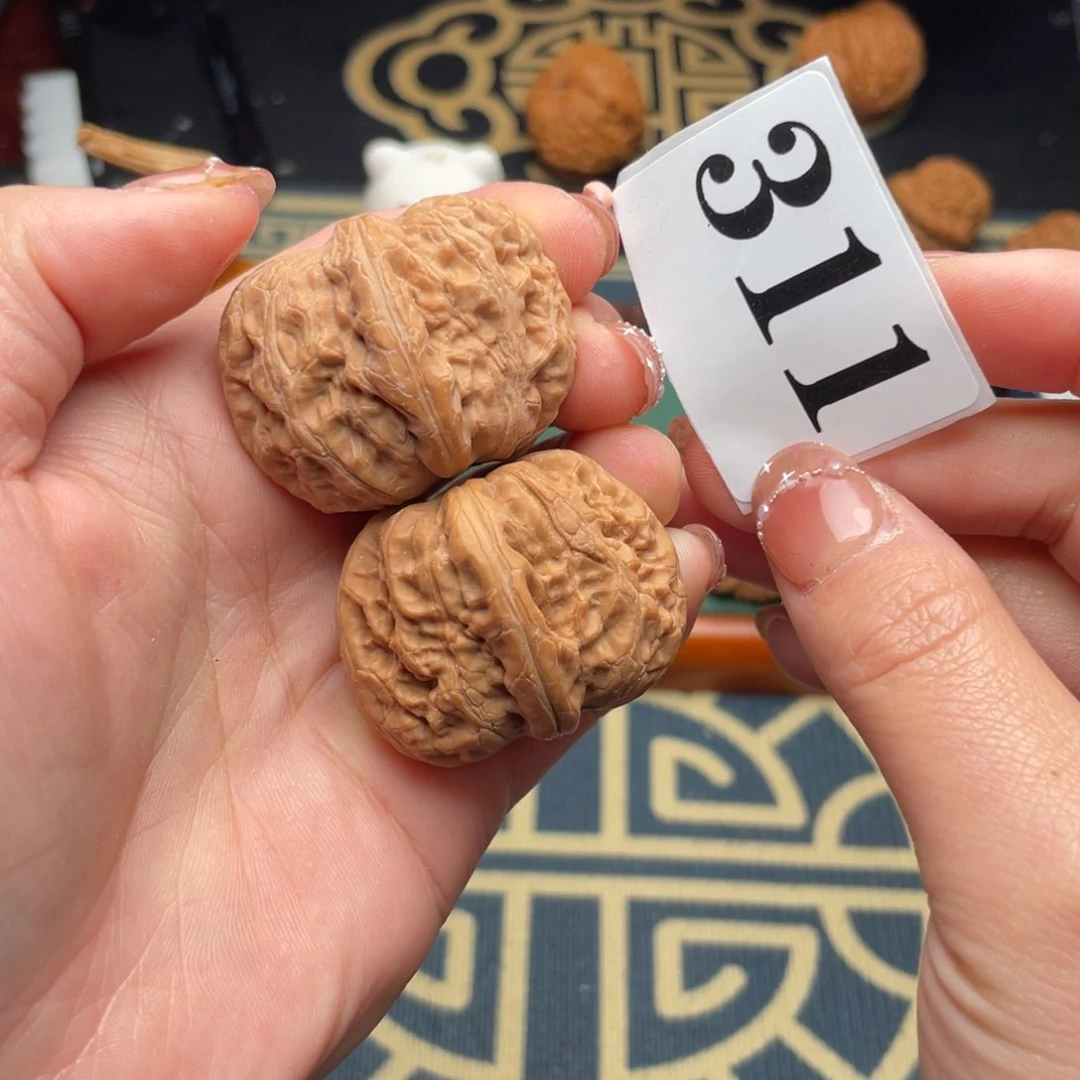 桃核把件39元宝311号……