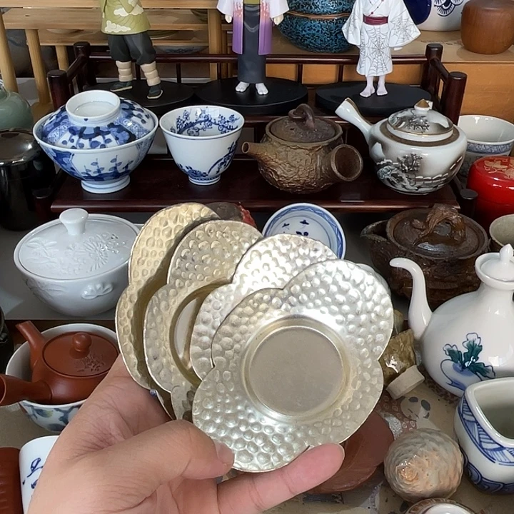 ****物瓷片四个铜杯托好看的