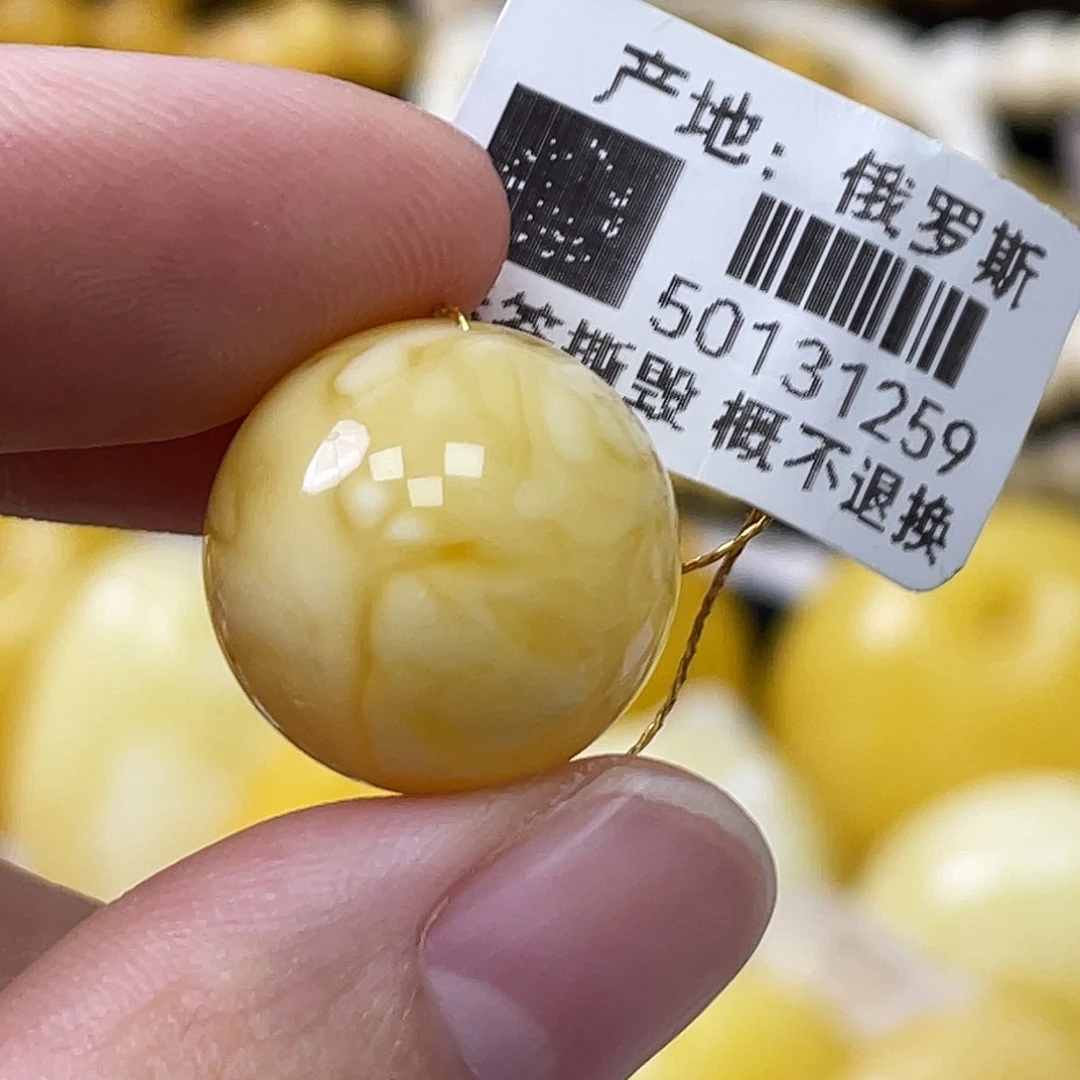 蜜蜡未镶嵌珠宝奇石文*。16.6mm浓蜡妖花 瑕