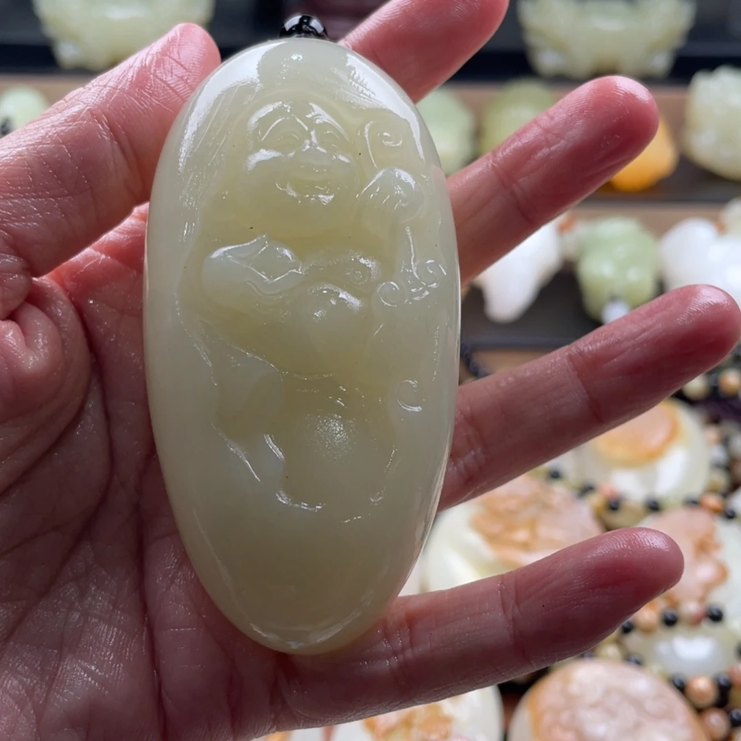 珍***生石材古青石手把件