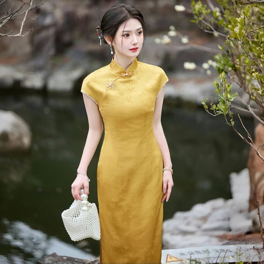 黄色高考送考旗袍女夏季新款素雅气质修身改良年轻款新中式连衣裙