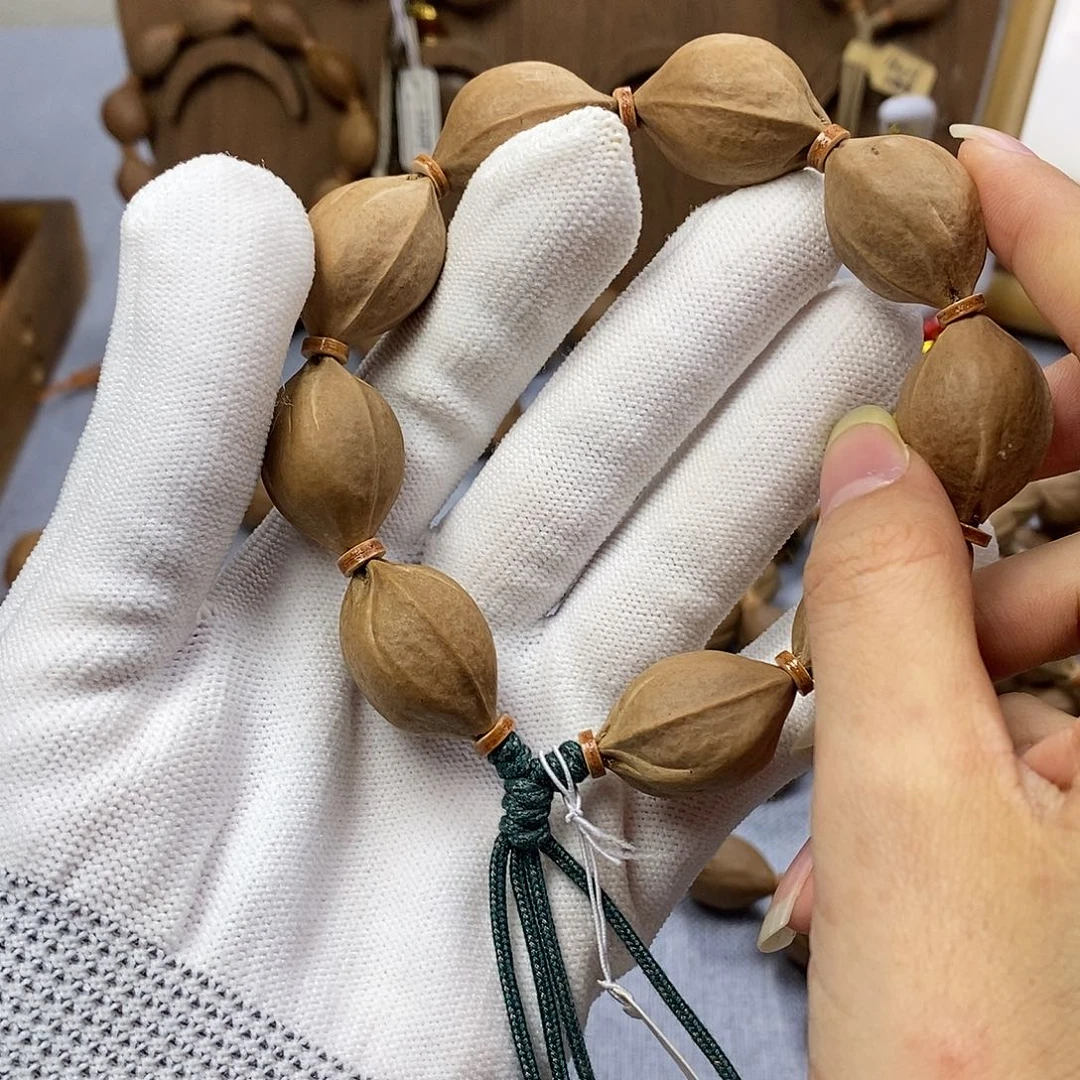 梁***！手串橄榄核梅林铁核1926