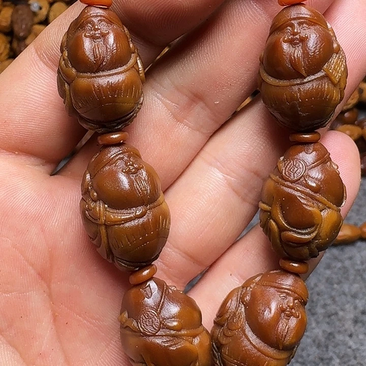 橄榄核手串你是谁